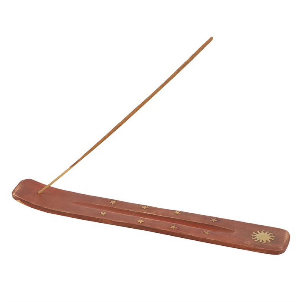 Wooden incense holder with a single incense stick on a white background