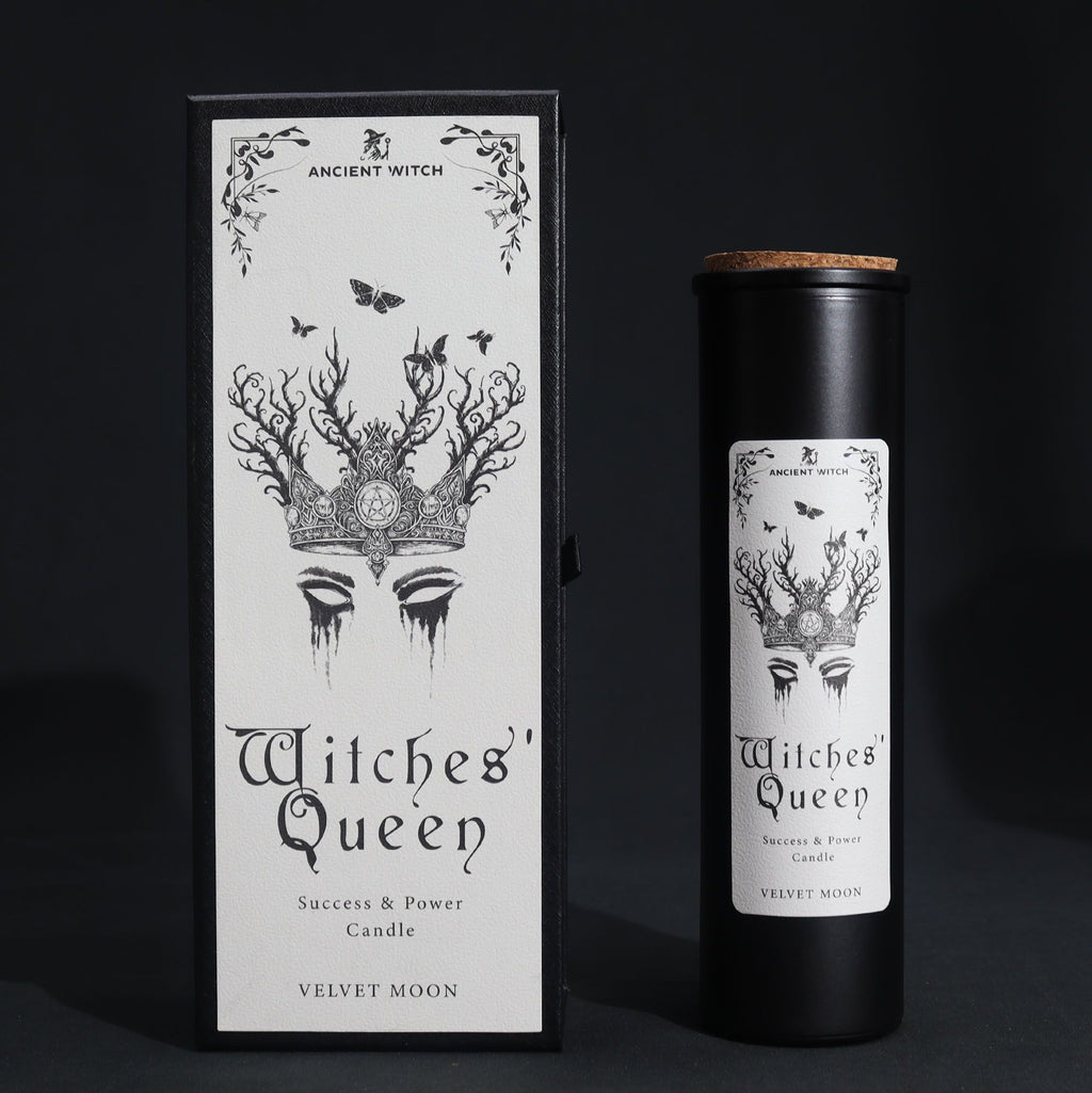 Witches' Queen candle packaging with black and white design on a dark background