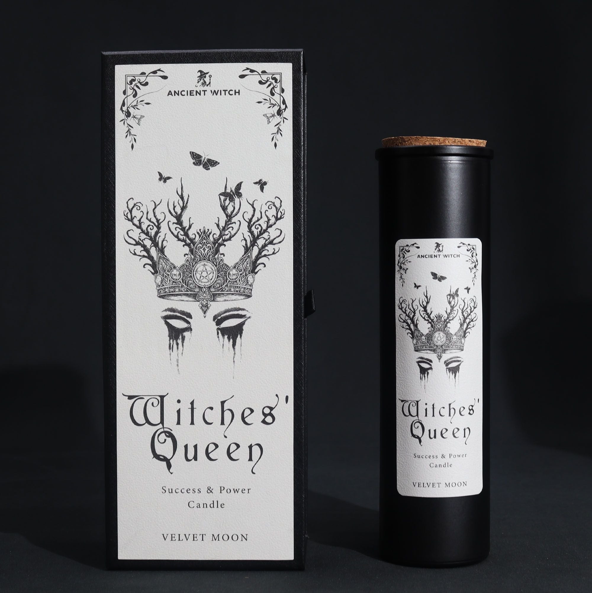 Witches' Queen candle packaging with black and white design on a dark background