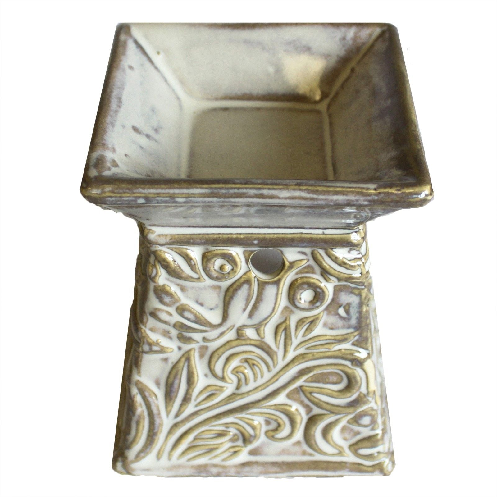 Decorative ceramic oil burner with floral patterns on a white background