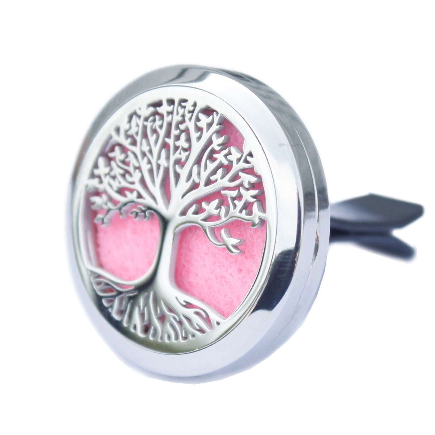 Decorative car air freshener with tree of life design on a pink background