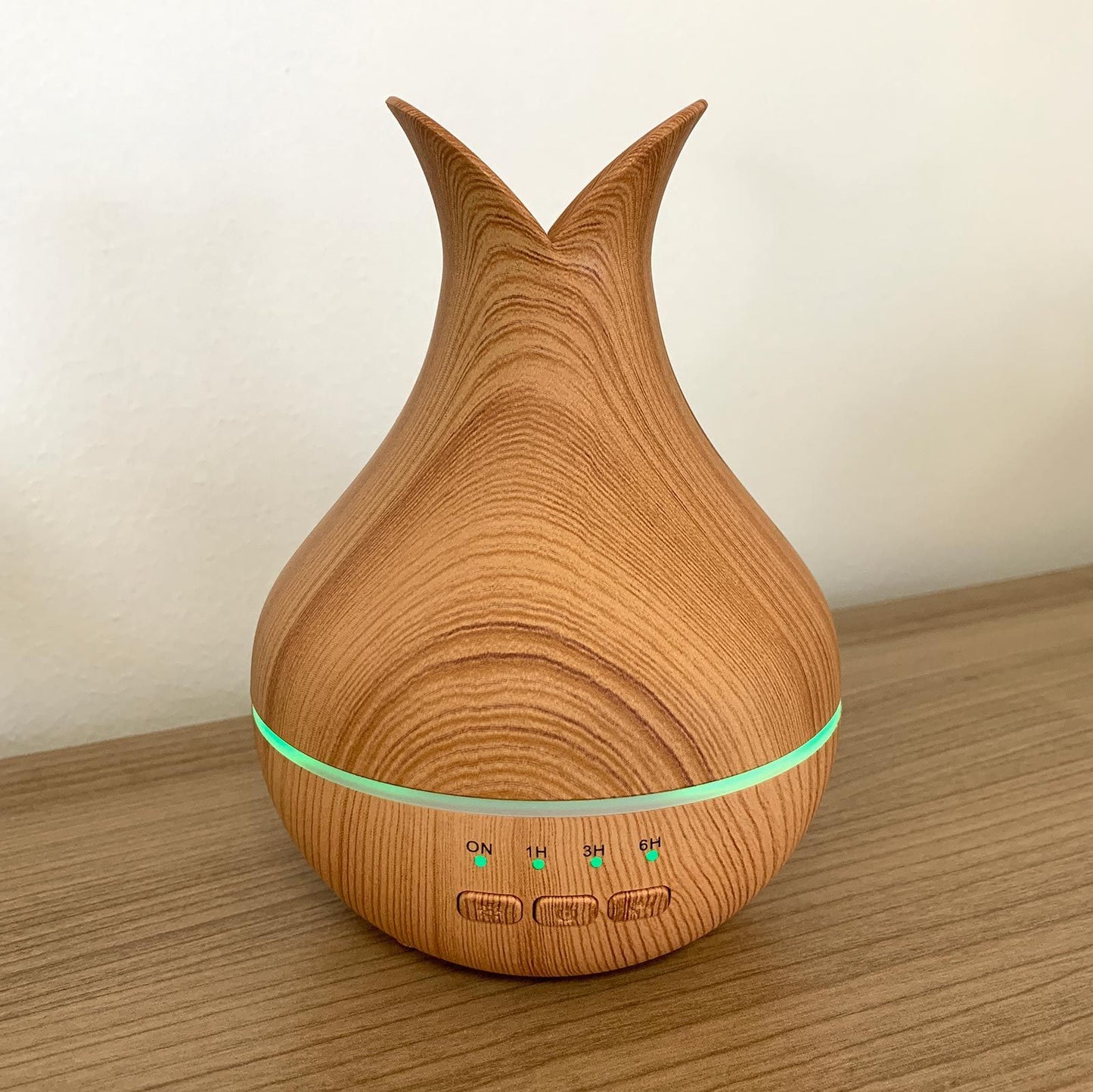 USB aroma diffuser showing colour changing LED ambient lighting