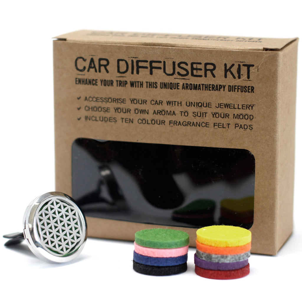 Car diffuser kit with packaging and colorful fragrance felt pads on a white background