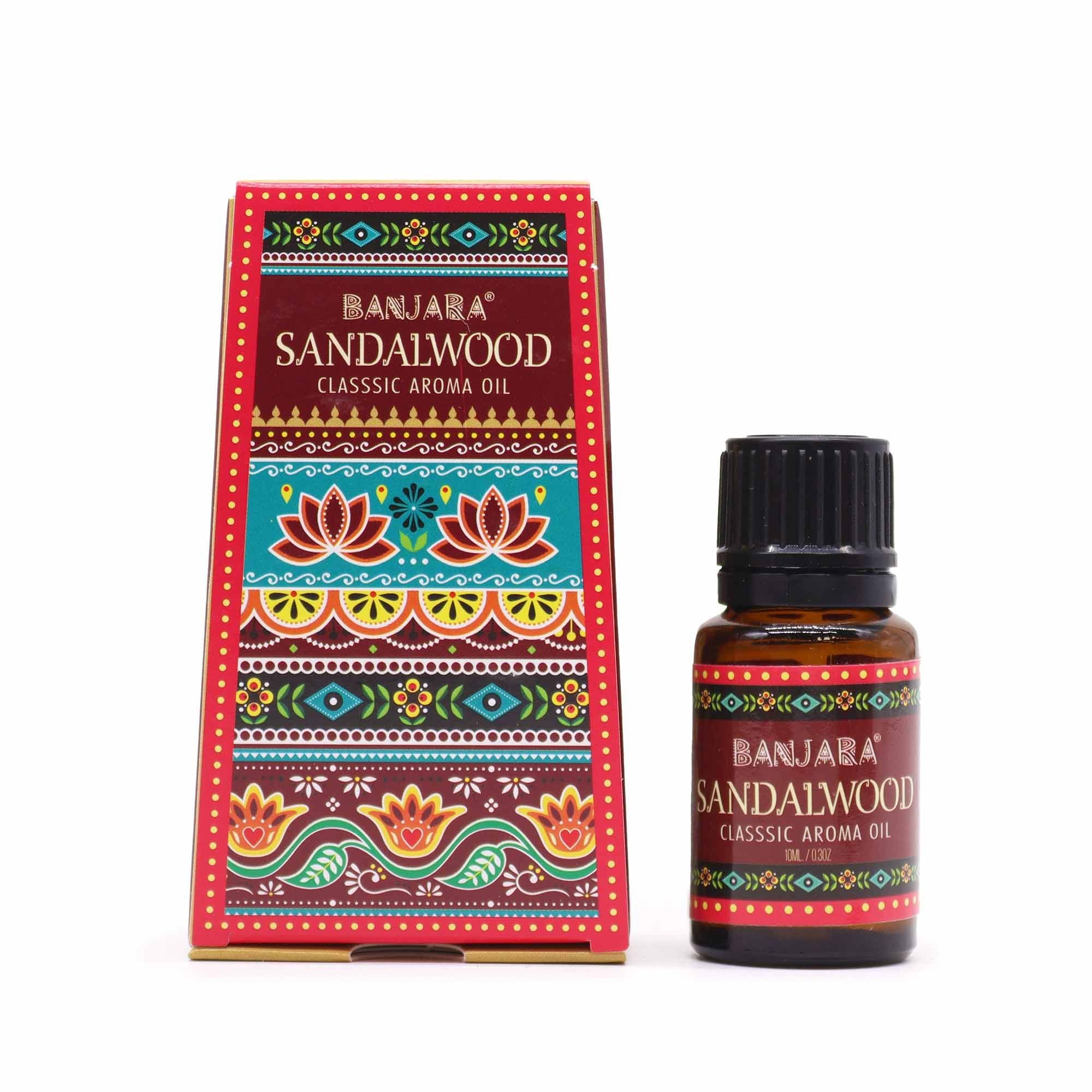 Sandalwood aroma oil bottle with colorful packaging on a white background