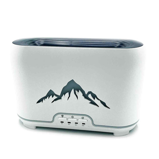 White electronic aroma diffuser with mountain design on a white background
