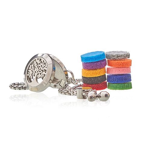 A silver diffuser necklace with colorful felt refills on a white background