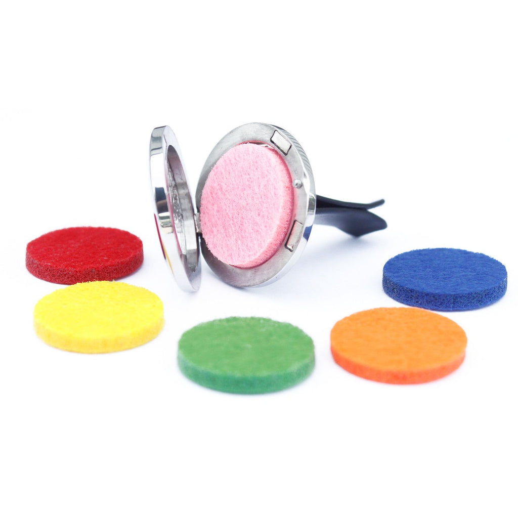 Car aromatherapy diffuser showing felt pad inserts