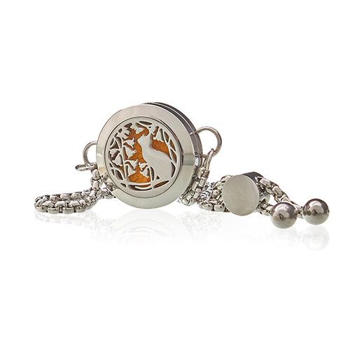 Silver bracelet with a round charm featuring a cat design on a white background