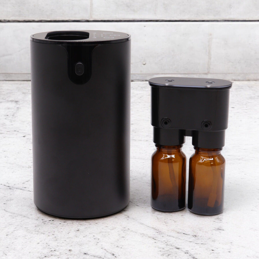 Dual chamber nebulizer diffuser showing two oil compartments