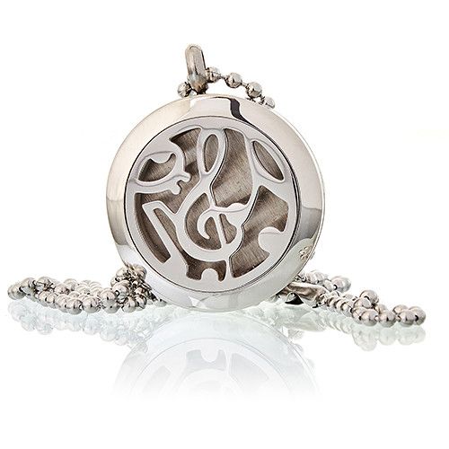 Silver pendant with musical note design on a white background