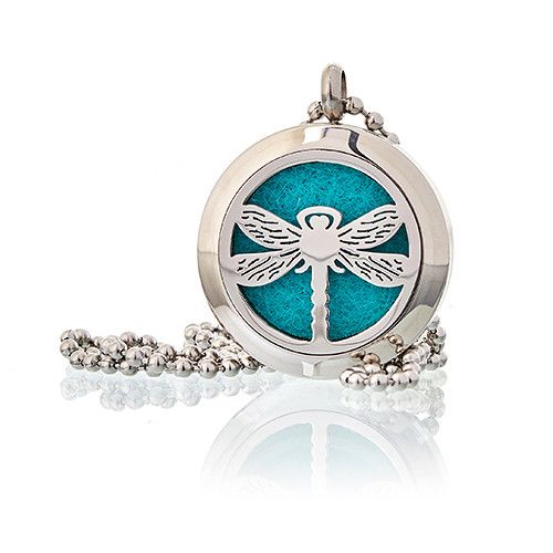Silver pendant with dragonfly design on a blue background, attached to a chain.