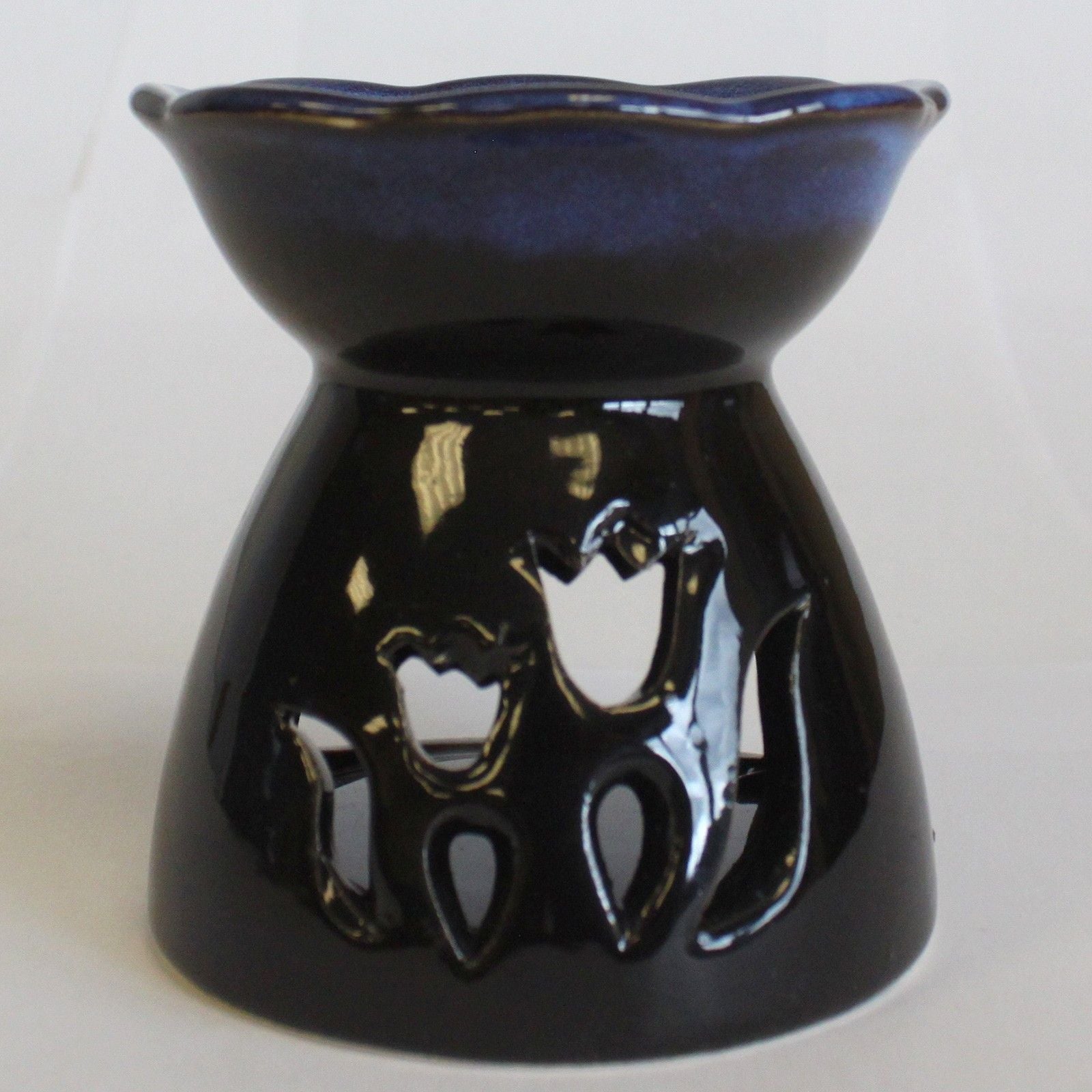 Black/blue ceramic oil burner with tulip design on a white background