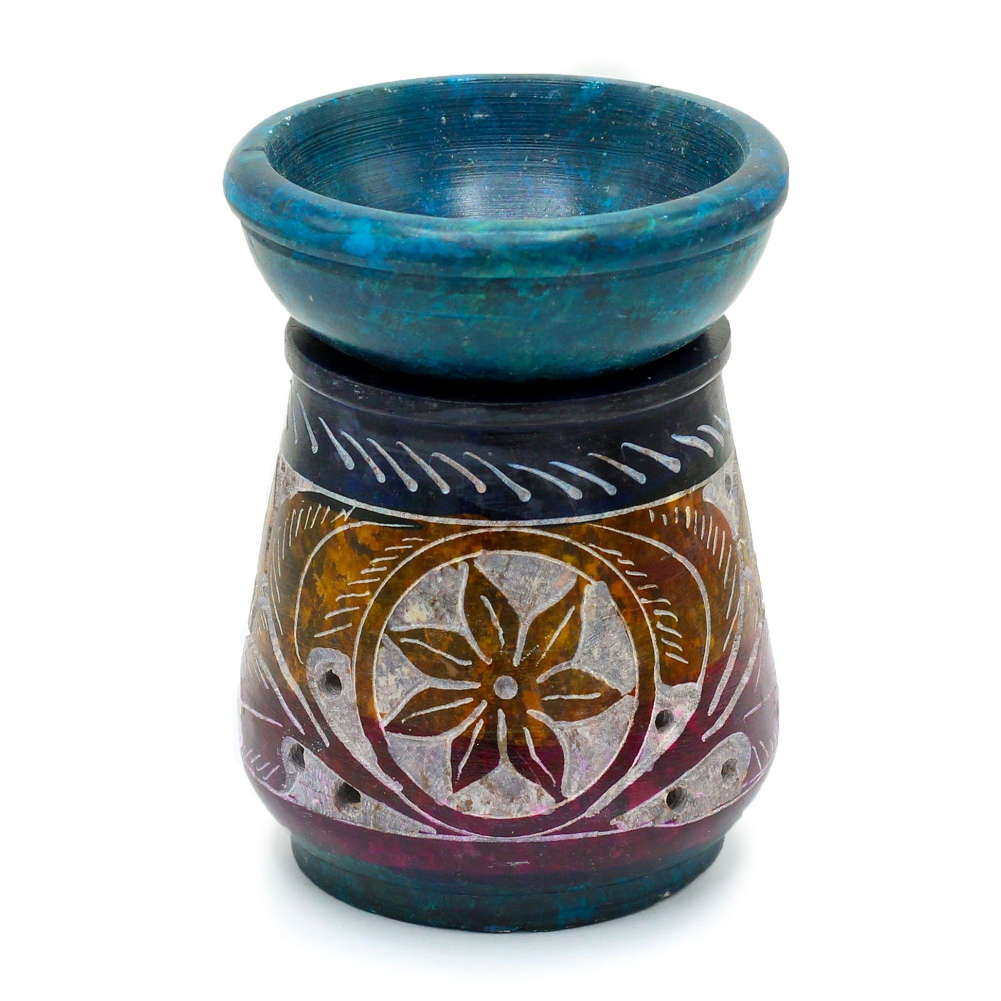 Ceramic oil burner with blue top and decorative base on a white background