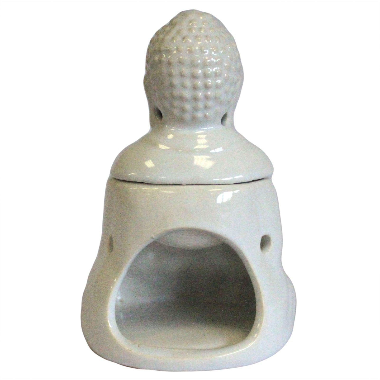White ceramic oil burner with a textured top on a white background