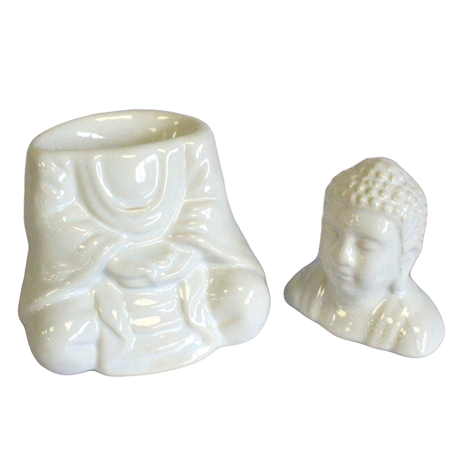 Two white ceramic Buddha statues on a white background
